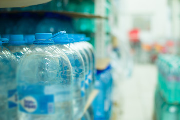 Bottles with fresh water in supermarket