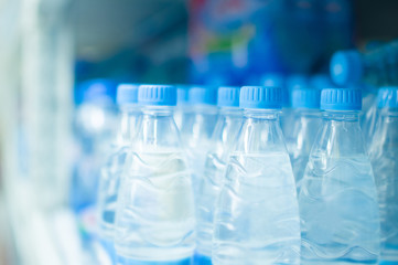 Bottles with fresh water in supermarket