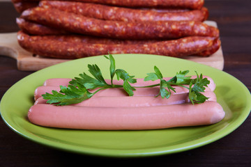 Sausage and sausages on an  wooden table