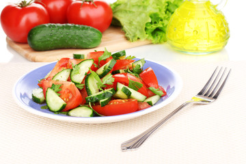 Fresh salad with tomatoes and cucumbers