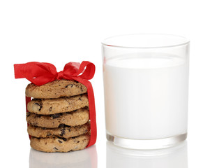 Glass of milk and cookies isolated on white