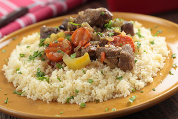 Lamb meat with vegetables and couscous