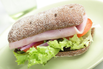 Sandwich with ham and vegetables
