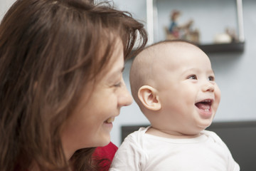 lovely portrait of mother together with son smiling