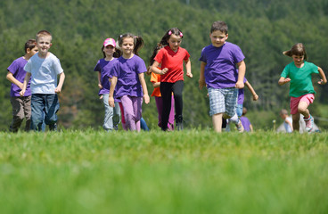 Obraz premium happy kids group have fun in nature