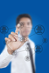 Businessman write Social Network diagram.