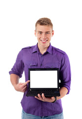 Young man with open laptop. Isolated