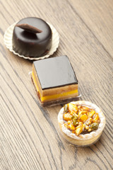 chocolate pastry little cake  on  wooden table