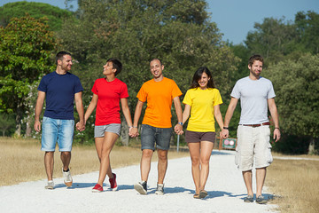 Obraz premium Group of People Walking Together outdoor
