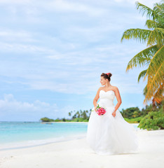 Fototapeta na wymiar A bride on a beach in Kuredu resort, Maldives island