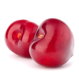 Two heart shaped cherry berries