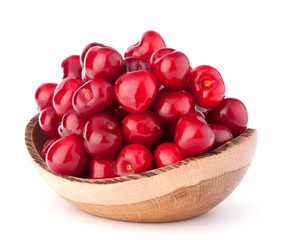cherry berries in wooden bowl