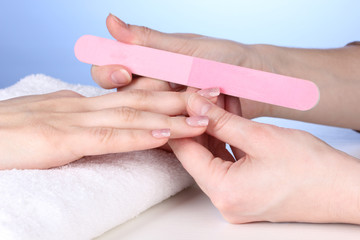 Manicure process in salon