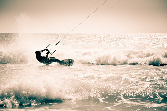 Kite surfing in waves.