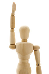 手を挙げた木製の人形