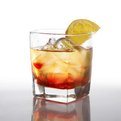 Cocktail with liquor and lemon