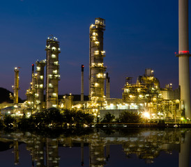 Obraz na płótnie Canvas Petrochemical industry on sunset dark blue sky.