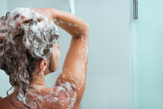 Portrait of relaxed woman taking shower