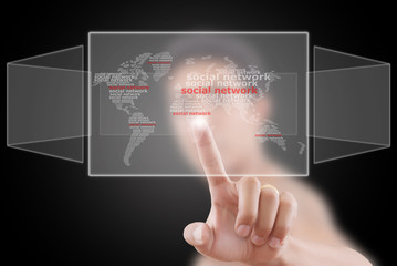 Businessman pushing Social Network world map.