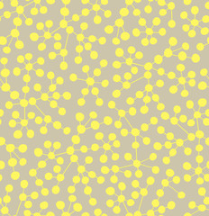 Connected yellow circles on beige background. Seamless pattern