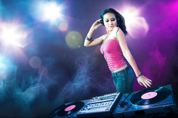 Beautiful DJ girl at the club