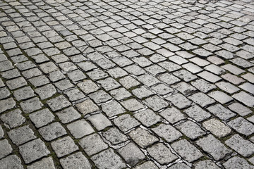 detail of cobble stone street gives a harmonic pattern