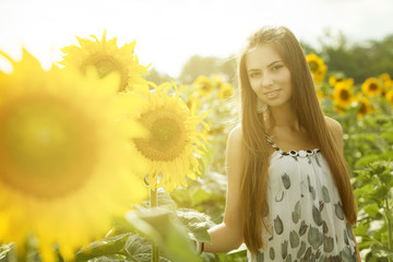 Girl and sunflowers