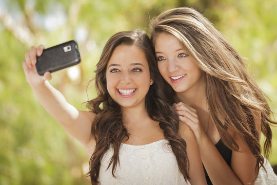 Attractive Mixed Race Girlfriends Taking Self Portrait with Came