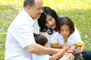 Fototapeta premium happy family in the park