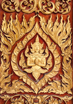 Close up traditional Thai style on door in temple Thailand