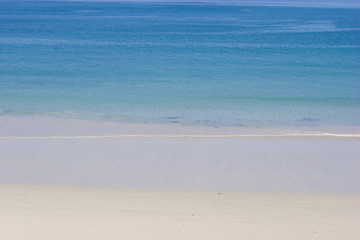 sunny day at the beach, with the sea