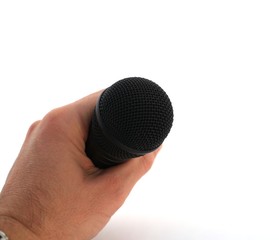Hand with microphone over white