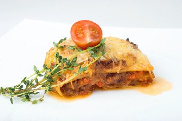 fresh baked lasagna on plates