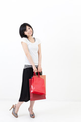 Fototapeta na wymiar a young asian woman in shopping