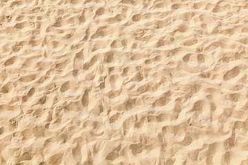 Fototapeta na wymiar pattern of fine sand by nature at the beach
