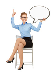smiling businesswoman with blank text bubble