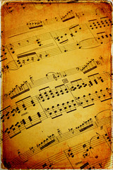 Naklejka premium Musical scores on old paper - old card