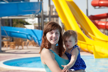 mother with  toddler at aquapark