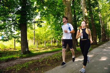 Fototapeta premium Young couple jogging