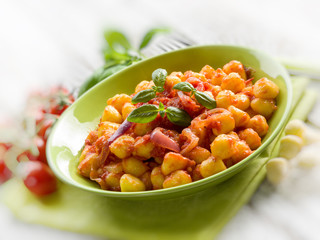 homemade gnocchi with tomato sauce, selective focus