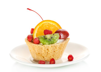 sweet cake with fruits on plate isolated on white