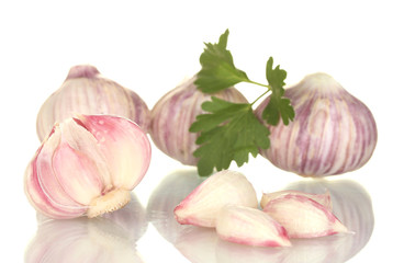 young garlic peeled with parsley isolated on white background