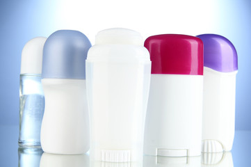 deodorant on blue background