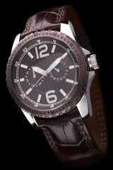 Luxury mens watch on black background