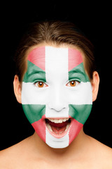girl with basque flag on her face