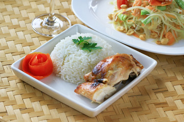 Chicken rice on bamboo floor