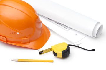 Orange hard hat, druft, pencil and tape measure