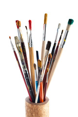 Fototapeta premium Set of brushes are in the container, isolated on white