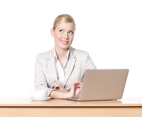 Businesswoman sitting at a table with a cup of coffee, isolated