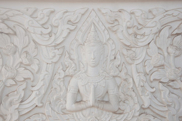 carving deity statue in thai temple